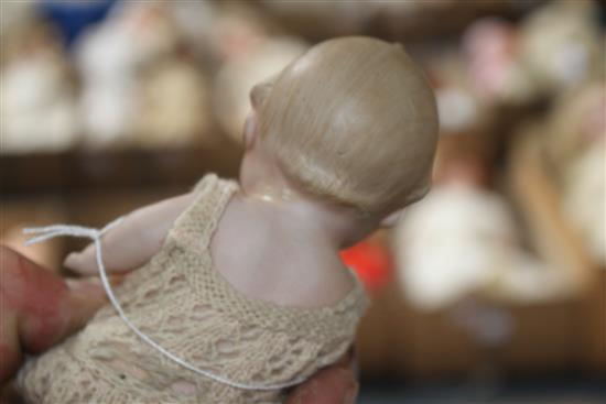 An SFBJ 23b doll,10in., firing fault to rim of head and a Heubach bisque baby, 5in.